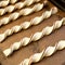 Raw chocolate puff pastry twists breadsticks freshly prepared fo