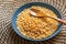 raw corn kernels in the blue plate