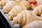 Raw croissants of yeast dough with cheese