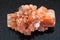 raw crystal of Aragonite gemstone on dark