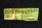 raw crystal of Heliodor (yellow beryl) on dark