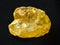 raw crystal of sulphur stone on dark background