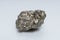 Raw crystalline pyrite iron pyrite, fool's gold . Mineral pyrite from the group of sulfides. The mineral pyrite on a