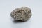 Raw crystalline pyrite iron pyrite, fool's gold . Mineral pyrite from the group of sulfides. The mineral pyrite on a