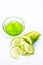 Raw cucumber along with some aloe vera gel well mixed in a glass bowl isolated on white entire ingredients.Used to rejuvenate your