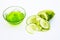 Raw cucumber along with some aloe vera gel well mixed in a glass bowl isolated on white entire ingredients.Used to rejuvenate your