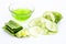 Raw cucumber along with some aloe vera gel well mixed in a glass bowl isolated on white entire ingredients.Used to rejuvenate your