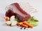 Raw deer meat with vegetables