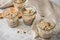 Raw dough of wholegrain bread with chia, oats, flaxseeds, sunflower and pumpkin seeds in glass jar for canning and prepper long