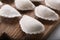 Raw dumplings (varenyky) on grey table, closeup