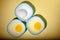 Raw egg & yellow yolk in three bowls