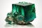 Raw emerald green stone from nature against white background