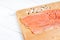 Raw fillet pink salmon on wooden board