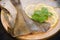 Raw fish sole round cutting board basil