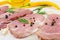 Raw flat meat for steak chop with spices on a light background