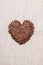 Raw flax seeds linseed heart shaped