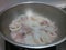 Raw fresh calamari in a silver pan
