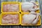 Raw fresh chicken with skin and bones, the whole chicken with breasts, legs, thighs, chicken meat that is ready for baking,