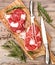 Raw fresh meat Ribeye Steak with herbs and spices on wooden desk