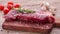 Raw fresh meat steak with herbs and spices on rustic background