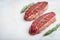 Raw fresh meat Top Blade steaks on light background. with copy space