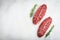 Raw fresh meat Top Blade steaks on light background. top view with copy space