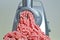 Raw fresh minced meat and electric meat grinder