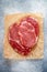 Raw fresh organic marbled meat. Beef, sea salt, pepper and garlic on the table. Rib eye steak Ribeye Black Angus to prepare a