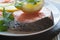 Raw fresh salmon cutlet steak with lemon and parsley garnish