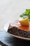 Raw fresh salmon cutlet steak with lemon and parsley garnish