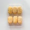 Raw frozen croquettes in transparent tray. Mediterranean and spanish cuisine. Preserved food for sale.