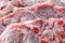 Raw frozen meat pieces. raw pork chops close-up texture. Fast freeze meat product