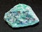 raw Fuchsite (chrome mica) stone on dark
