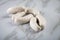 Raw German Bavarian WeiÃŸwurst white sausage chain on marble background