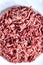 Raw ground beef on a white plate