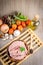 Raw ground meat in wood bowl.