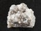 raw Halite (rock salt) stone on dark background