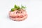 Raw Hamburger,meatballs on white background. fast food at home.Convenience food, precooked.Raw chicken burger on a white plate in
