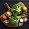 Raw ingredients for cooking cream broccoli soup on wooden background