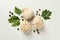 Raw khinkali, pepper and parsley on white background