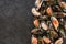 Raw kiwi mussels on slate stone background. Seafood, Shellfish, top view, flat lay, macro
