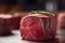 Raw, lean beef steak on a dark background. The meat is perfectly sliced and ready for cooking on a grill.