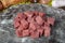 Raw lean diced casserole beef steak. Pile of cube chopped pile raw diced beef cubes. Turkish name; Dana Kusbasi