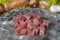 Raw lean diced casserole beef steak. Pile of cube chopped pile raw diced beef cubes. Turkish name; Dana Kusbasi