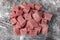 Raw lean diced casserole beef steak. Pile of cube chopped pile raw diced beef cubes. Turkish name; Dana Kusbasi