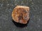 raw limonite (iron ore) stone on dark