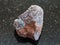 raw magnetite (iron ore) stone on dark background