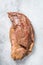 Raw marinated beef tri-tip steak for roast. White background. Top view