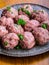 Raw meat balls. Prepared uncooked meat balls in a metal tray. Tr