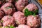 Raw meat balls. Prepared uncooked meat balls in a metal tray. Tr